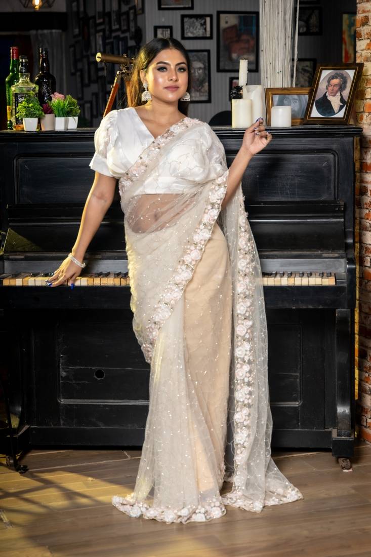 white woven net sequins work all seasons sarees