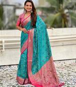 sea green color patola silk blend fabric woven meenakari designer saree