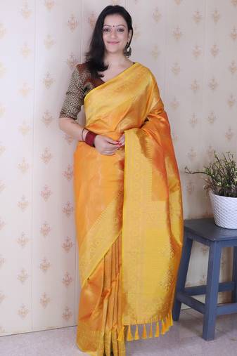 orange color soft silk blend  woven jari designer ethnic partywear saree