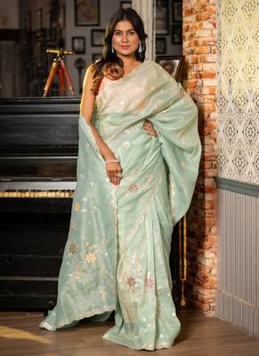 green woven tissue zari work all seasons sarees 1