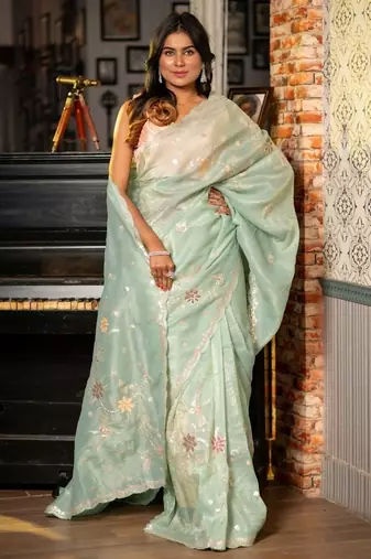 green woven tissue zari work all seasons sarees