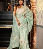 green woven tissue zari work all seasons sarees