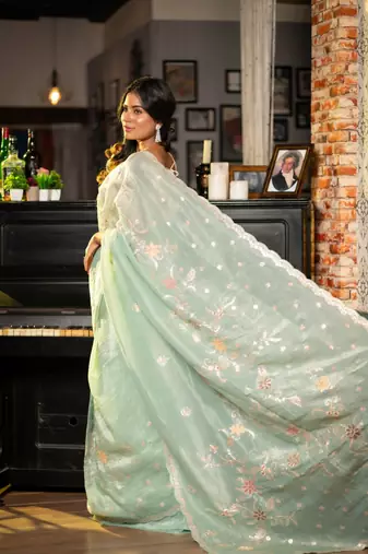 green woven tissue zari work all seasons sarees