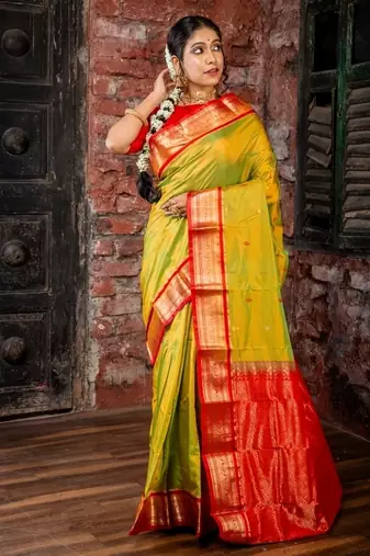 green woven faux kanjivaram silk blend zari work all seasons sarees