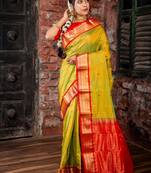 green woven faux kanjivaram silk blend zari work all seasons sarees
