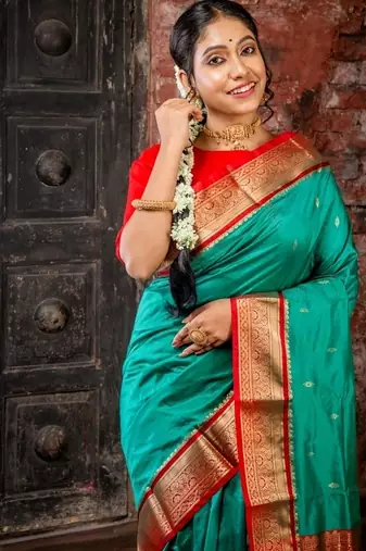 green woven faux kanjivaram silk blend zari work all seasons sarees