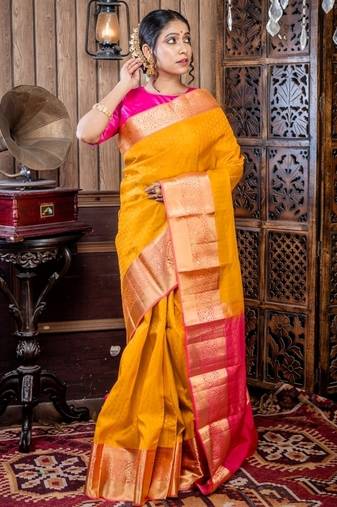 yellow woven faux silk blend blend zari work all seasons sarees