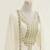 white georgette kaftan gown with gold zari work