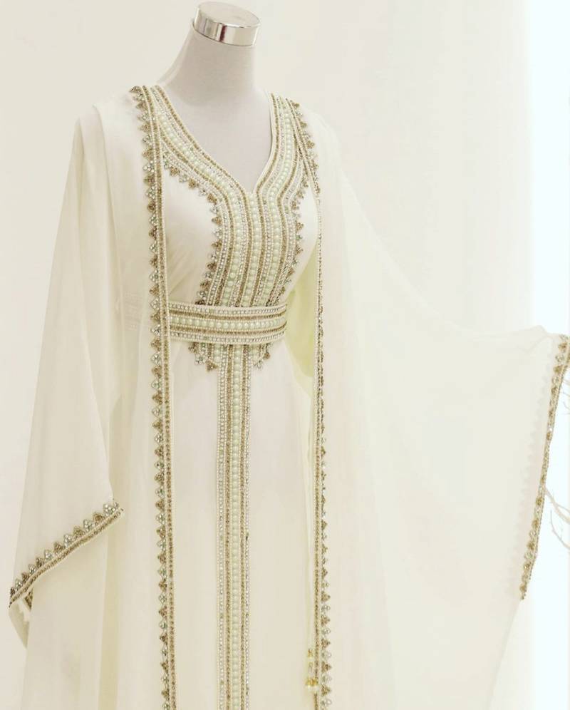 white georgette kaftan gown with gold zari work