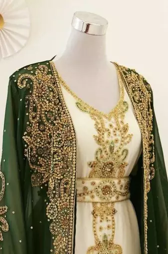 Green georgette kaftan gown with gold zari work
