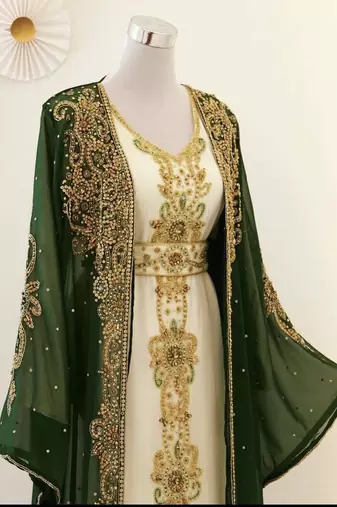 Green georgette kaftan gown with gold zari work