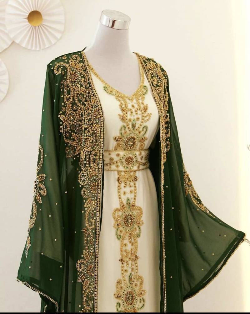 Green georgette kaftan gown with gold zari work