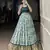 blue printed tassar silk lehenga choli with shrug
