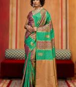 green silk blend blend saree with blouse piece