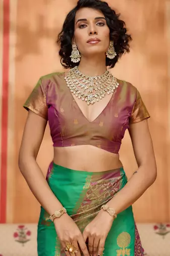 green silk blend blend saree with blouse piece