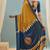 Mustard printed satin saree with blouse piece