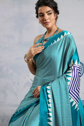 Turquoise printed satin saree with blouse piece