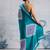 Turquoise printed satin saree with blouse piece