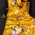 Yellow printed satin saree with blouse piece