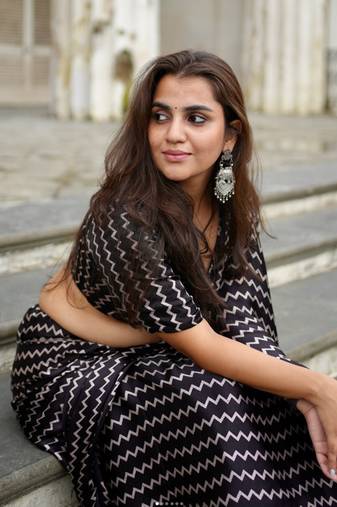 Black printed satin saree with blouse piece