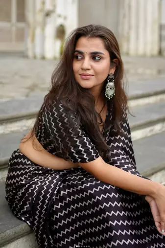 Black printed satin saree with blouse piece