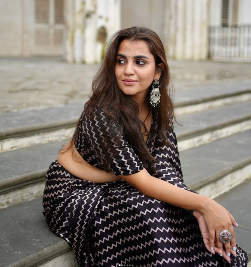 Black printed satin saree with blouse piece