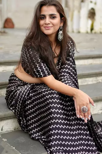 Black printed satin saree with blouse piece