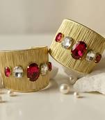 Gold plated combo of two red crystal cz ad stone western cuff bracelets bangle