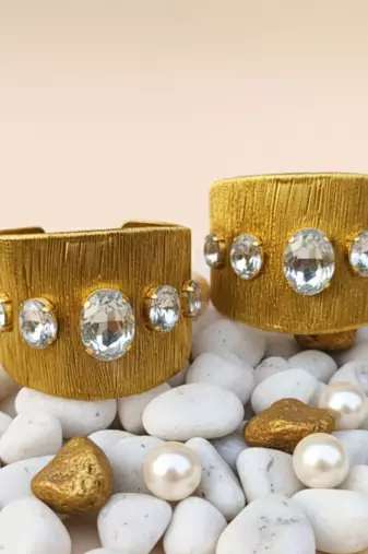 Gold plated combo of two white crystal cz ad stone floral cuff bracelets bangle