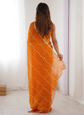 orange smooth sitara fabric moti & val sequence designer saree 4