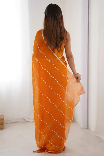 orange smooth sitara fabric moti & val sequence designer saree