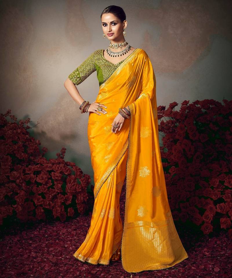 yellow wonderful designer chiniya silk blend saree catalog with heavy embroidered blouse