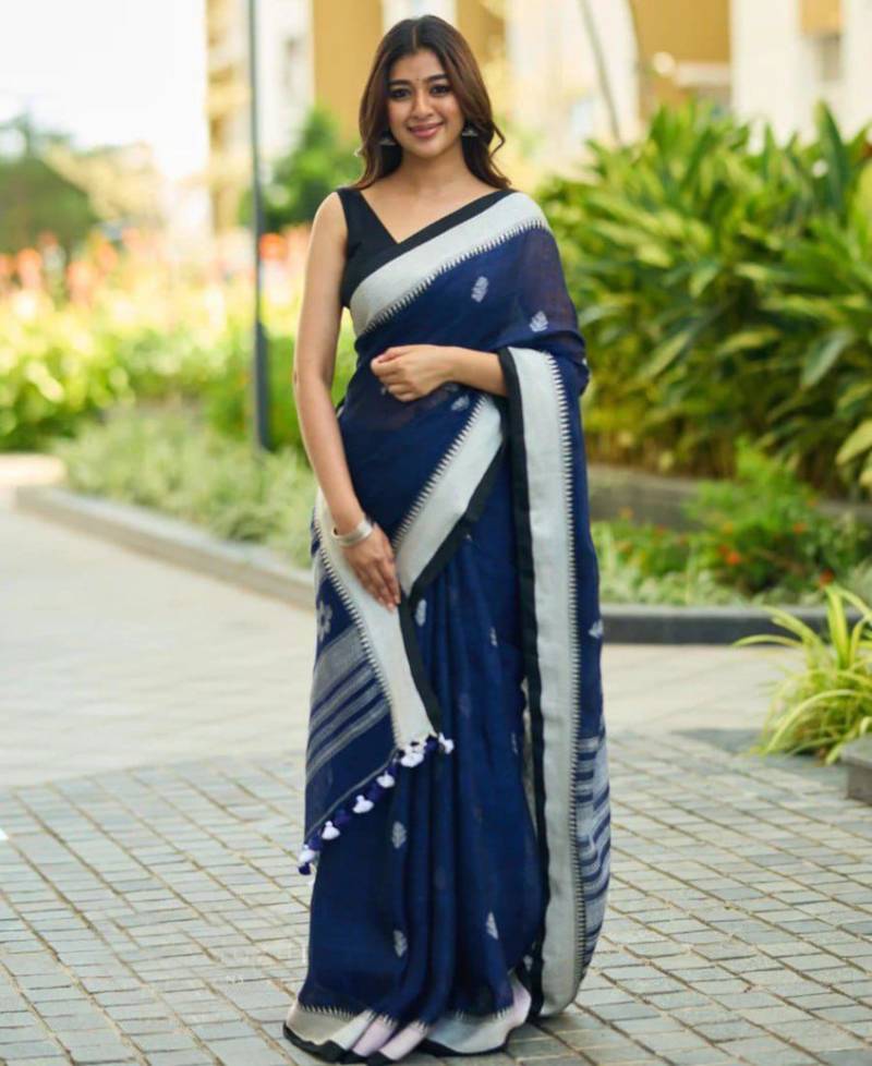 Teal blue cotton saree with contrast boarder and pallu