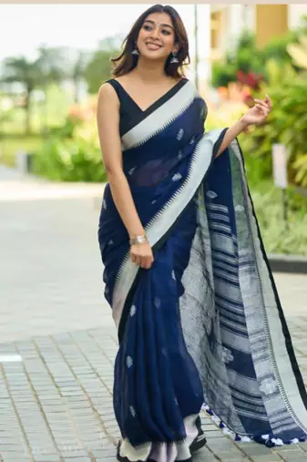 Teal blue cotton saree with contrast boarder and pallu