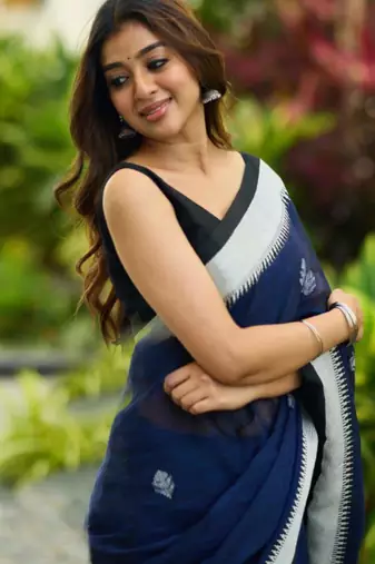 Teal blue cotton saree with contrast boarder and pallu
