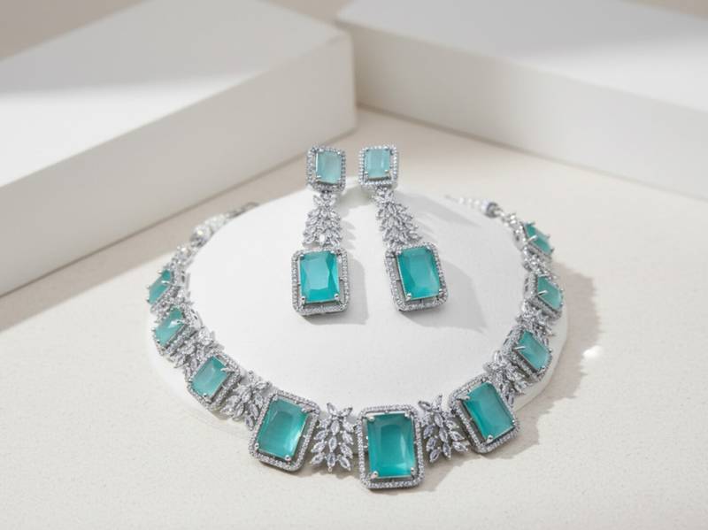 Zaveri pearls silver-plated sea green stone-studded jewellery set