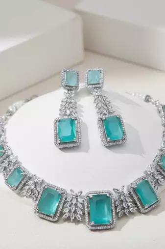 Zaveri pearls silver-plated sea green stone-studded jewellery set