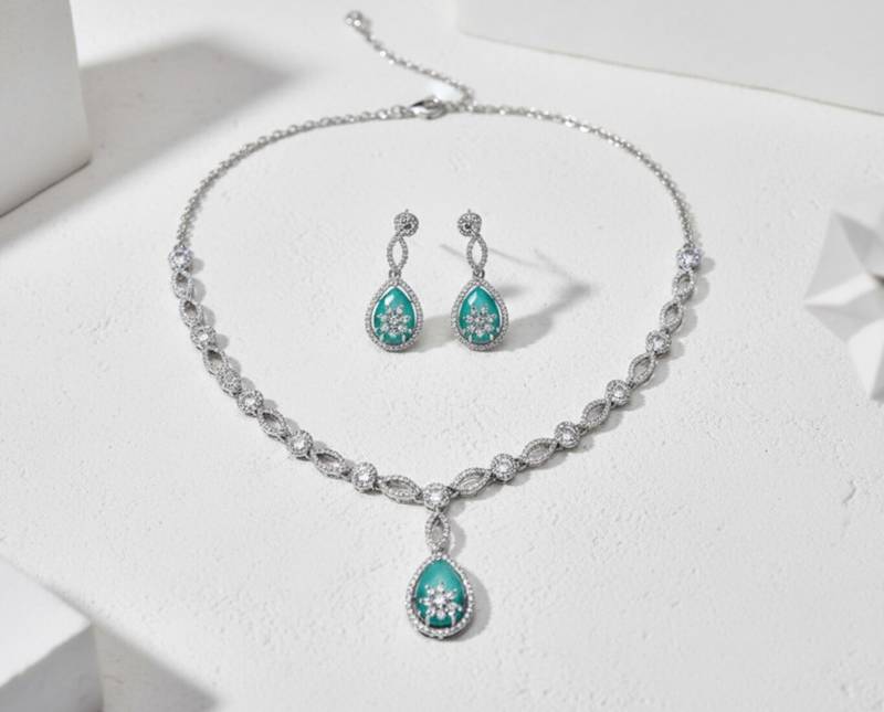 Silver-plated sea green teardrop stone-studded jewellery set