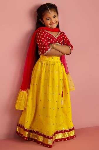  girls net fabric floral foil print cropped top with flared lehenga ethnic set – falsa & yellow for kids
