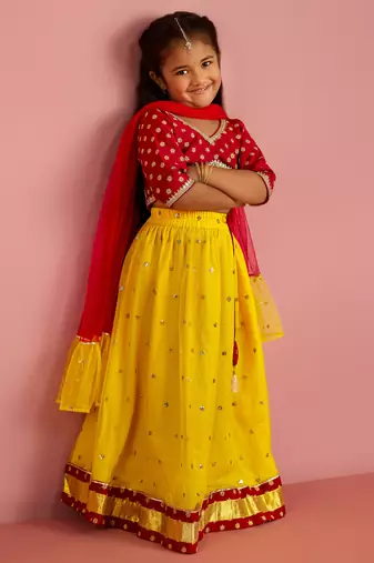 girls net fabric floral foil print cropped top with flared lehenga ethnic set     falsa & yellow for kids