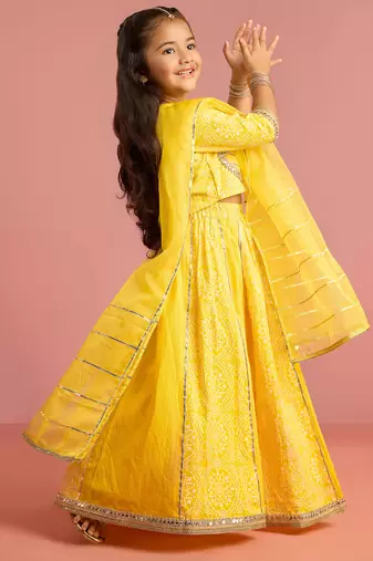 yellow bandhani printed lehenga choli set with organza dupatta