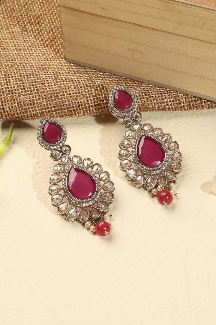 Stylish round and oval shape red kundan stone antique gold plated brass dangle earring for women