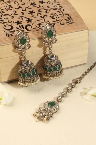 Leaf and oval shape green kundan stone antique gold plated jhumki earring with maang tikka for women