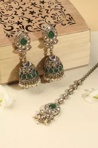 Leaf and oval shape green kundan stone antique gold plated jhumki earring with maang tikka for women