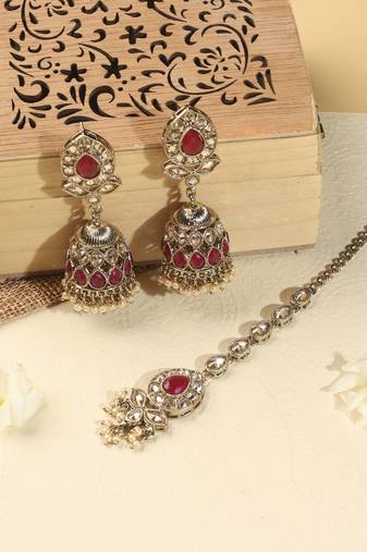 Leaf and oval shape green kundan stone antique gold plated jhumki earring with maang tikka for women