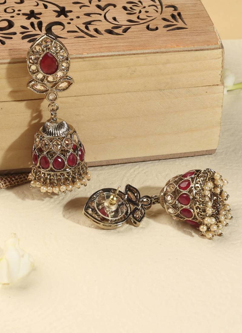 Leaf and oval shape green kundan stone antique gold plated jhumki earring with maang tikka for women