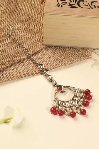 Leaf shape red pearl brown kundan gold plated brass chandelier earring with maang tikka for women