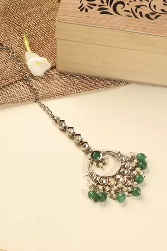 Leaf shape green pearl brown kundan gold plated brass chandelier earring with maang tikka for women