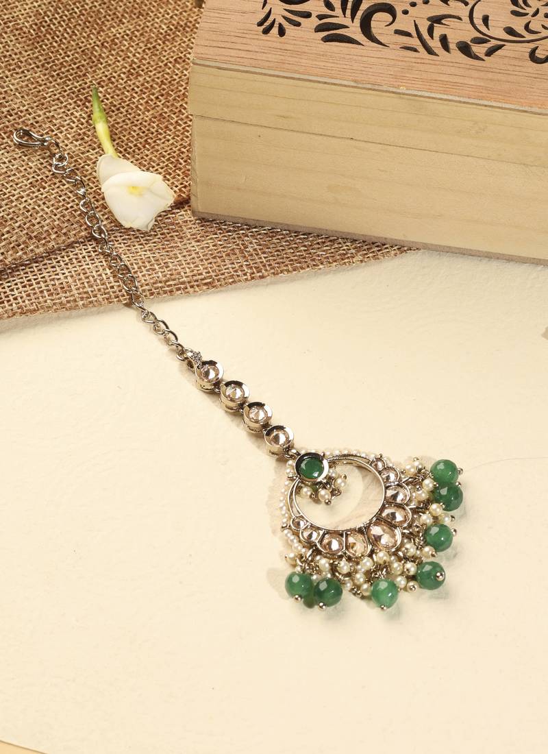 Leaf shape green pearl brown kundan gold plated brass chandelier earring with maang tikka for women