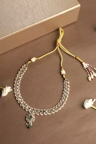 Flower and oval shape green kundan stone gold plated choker necklace set with maang tikka for women